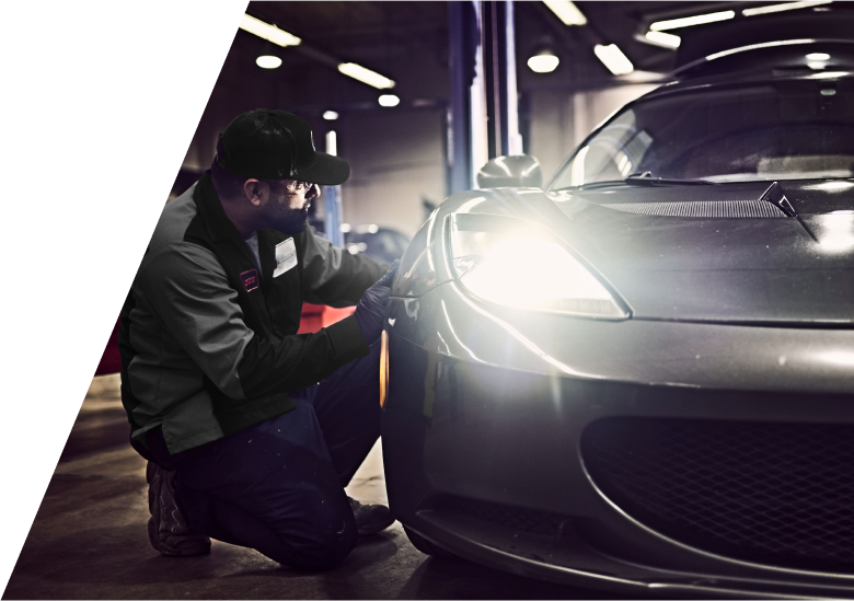 Technician working on a car